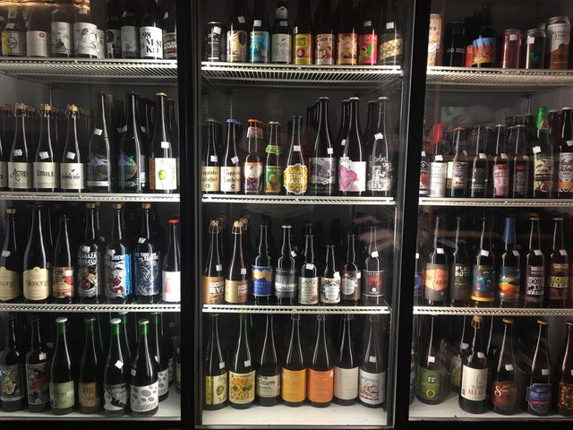 Our beverage cases displaying the many bottle options available