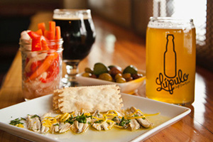 Tapas and beer available for patio dining or takeout